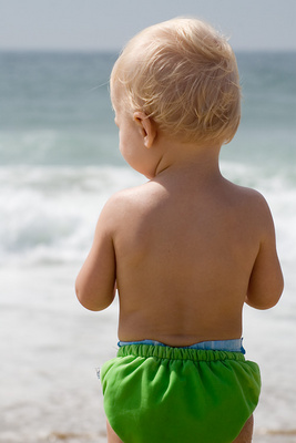 Pondering his first ocean waves