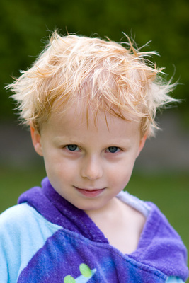 Delighted by his post-swimming 'crazy hair'