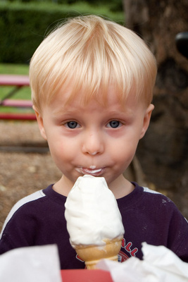 Nibbling away at an ice cream cone, which, yes, he eventually finished