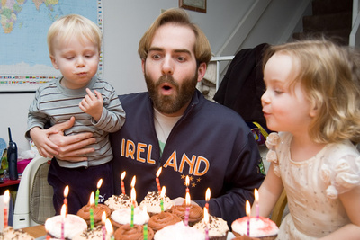Helping Papa blow out a whole mess of candles on his birthday