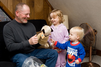 Just as excited as Grandpa to see his present (from them) opened