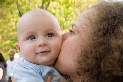 More watching his siblings have fun, more being smothered by Mama's kisses