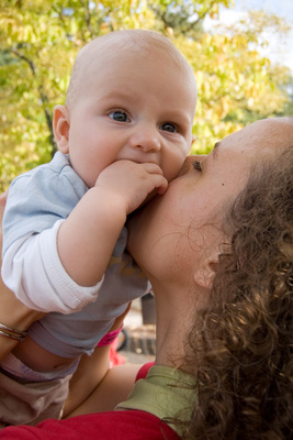 Nikola, confined to the amusement park sidelines, is comforted by Mama