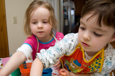 Going to work on the Easter eggs with her friend Emma