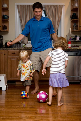 Introducing Uncle Phil to kitchen soccer, an after-dinner tradition in our house