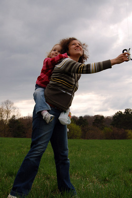 Holding tight, flying a kite