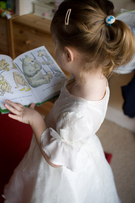 The princess reads a passage from Sammy the Seal, by Syd Hoff