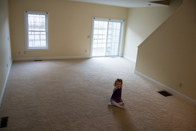 Lost in the vast expanse of our new living room