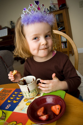 Nothing but chocolate-dipped strawberries for this princess