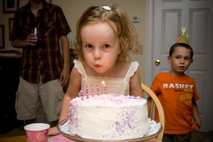 Hurrying through the candles to get at that cake