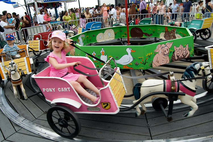 Riding the ponies on Coney Island